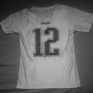 A #12 Brady jersey. Its like new condition.
